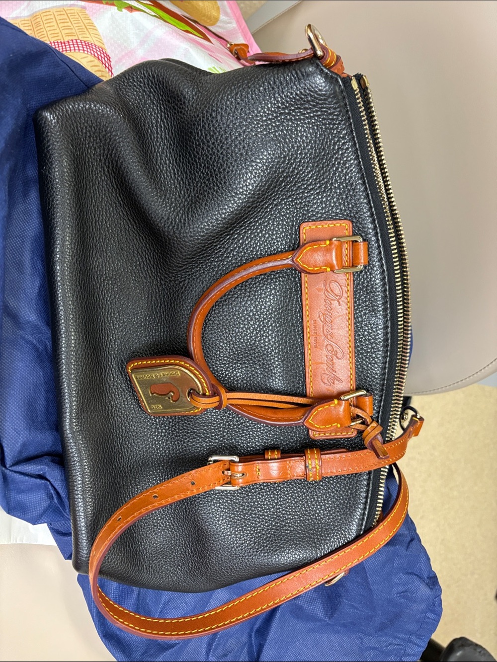 Dooney & Bourke Black Pebbled Leather Duffel with Tan Trim